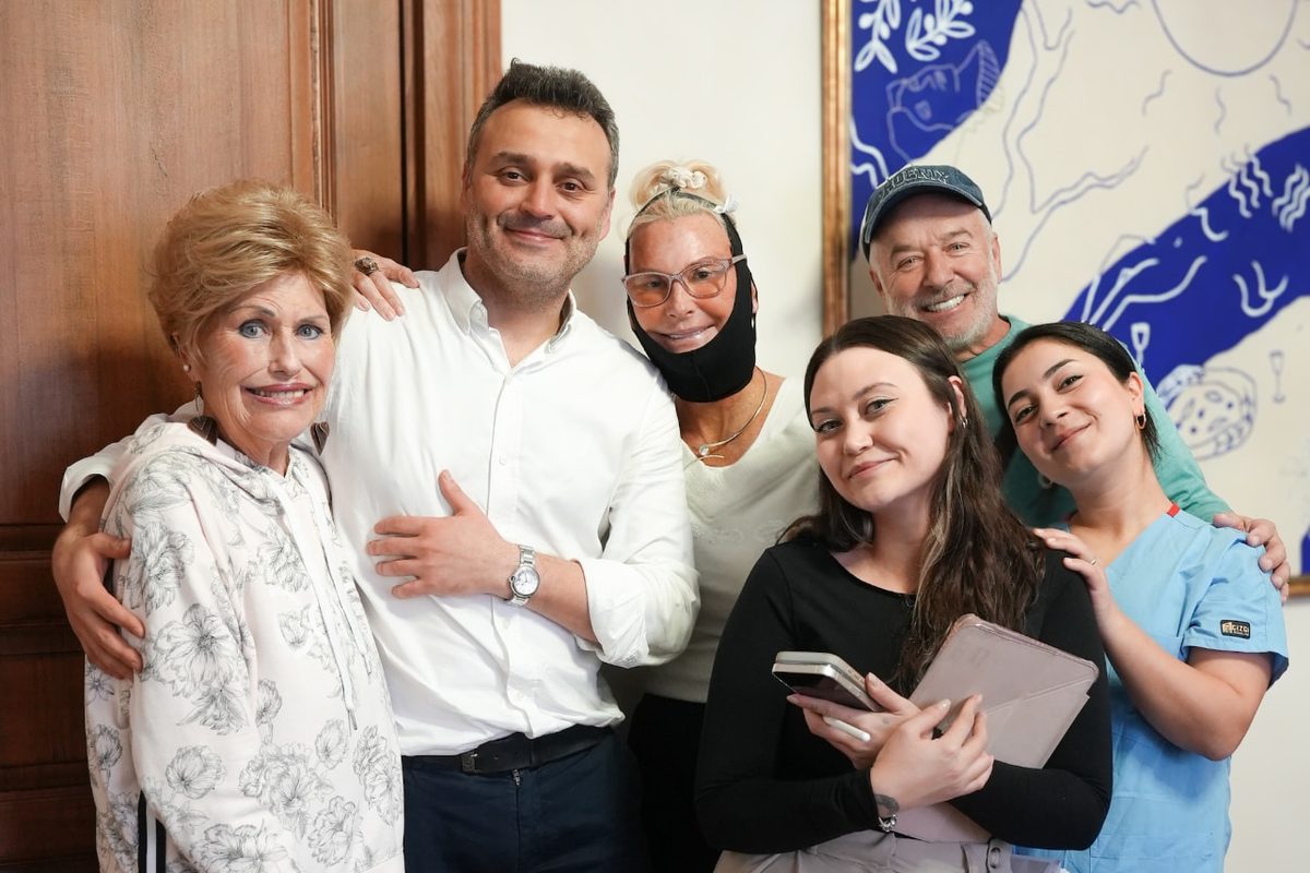 Facelift patients with their surgeon and care team at an aftercare visit in Istanbul